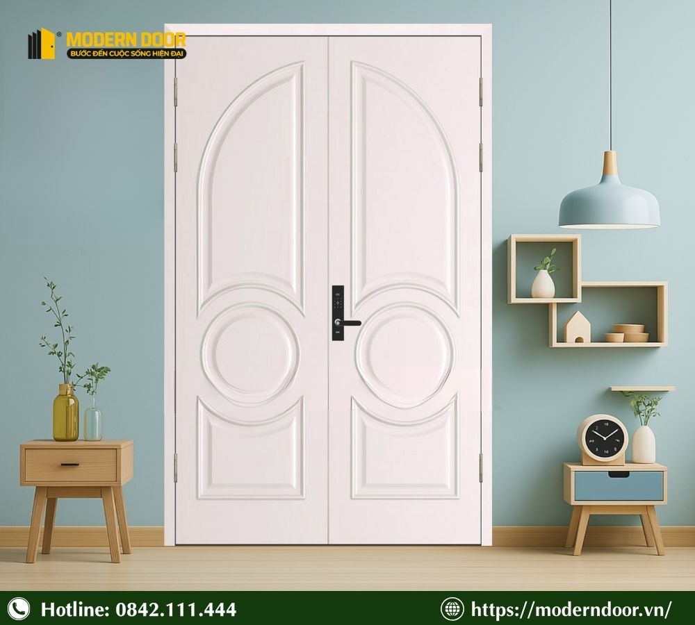Báo Giá Các Loại Cửa Cách Âm Phòng Ngủ Mới Nhất 2026 37 Mẫu cửa đôi màu trắng ngà tinh tế, khắc vân đối xứng. Chất liệu gỗ công nghiệp HDF