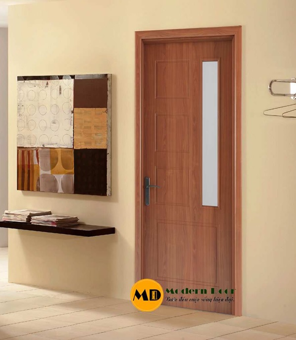 Mẫu cửa phòng ngủ bằng gỗ đơn giản, dễ dàng kết hợp với đồ nội thất để tạo nên không gian hài hòa